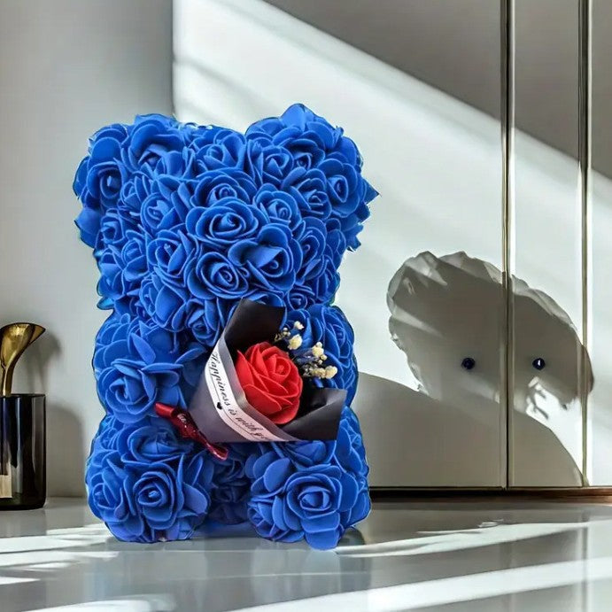 Rose bear with a bouquet of everlasting flowers