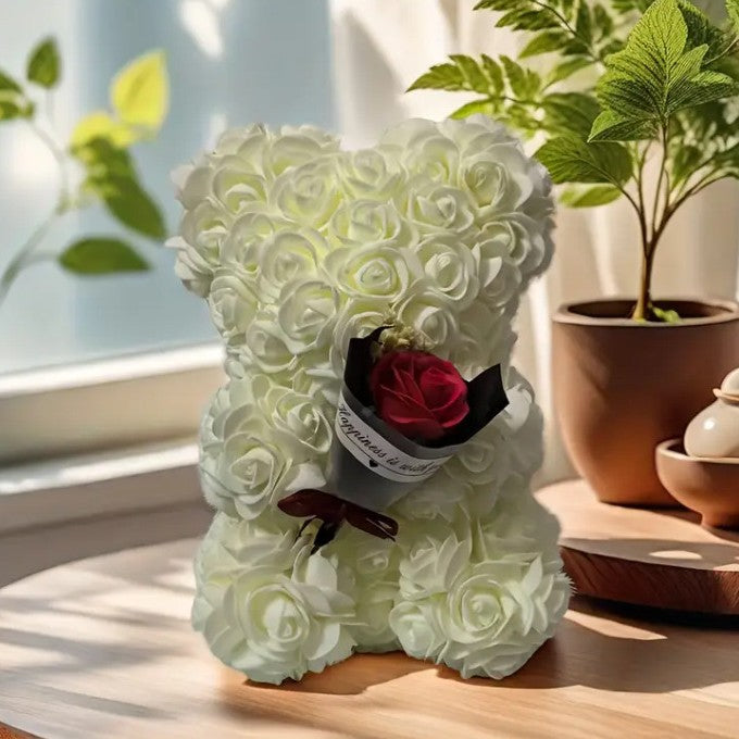 Rose bear with a bouquet of everlasting flowers