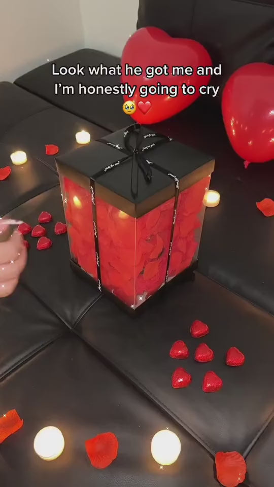 Rose bear with a bouquet of everlasting flowers